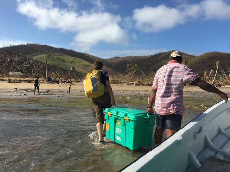 winston ca17d fiji cyclone shelterbox being carried to island